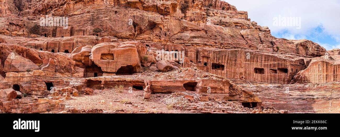 Rock formations with view of Nabataean Theater, Petra, Jordan Stock Photo