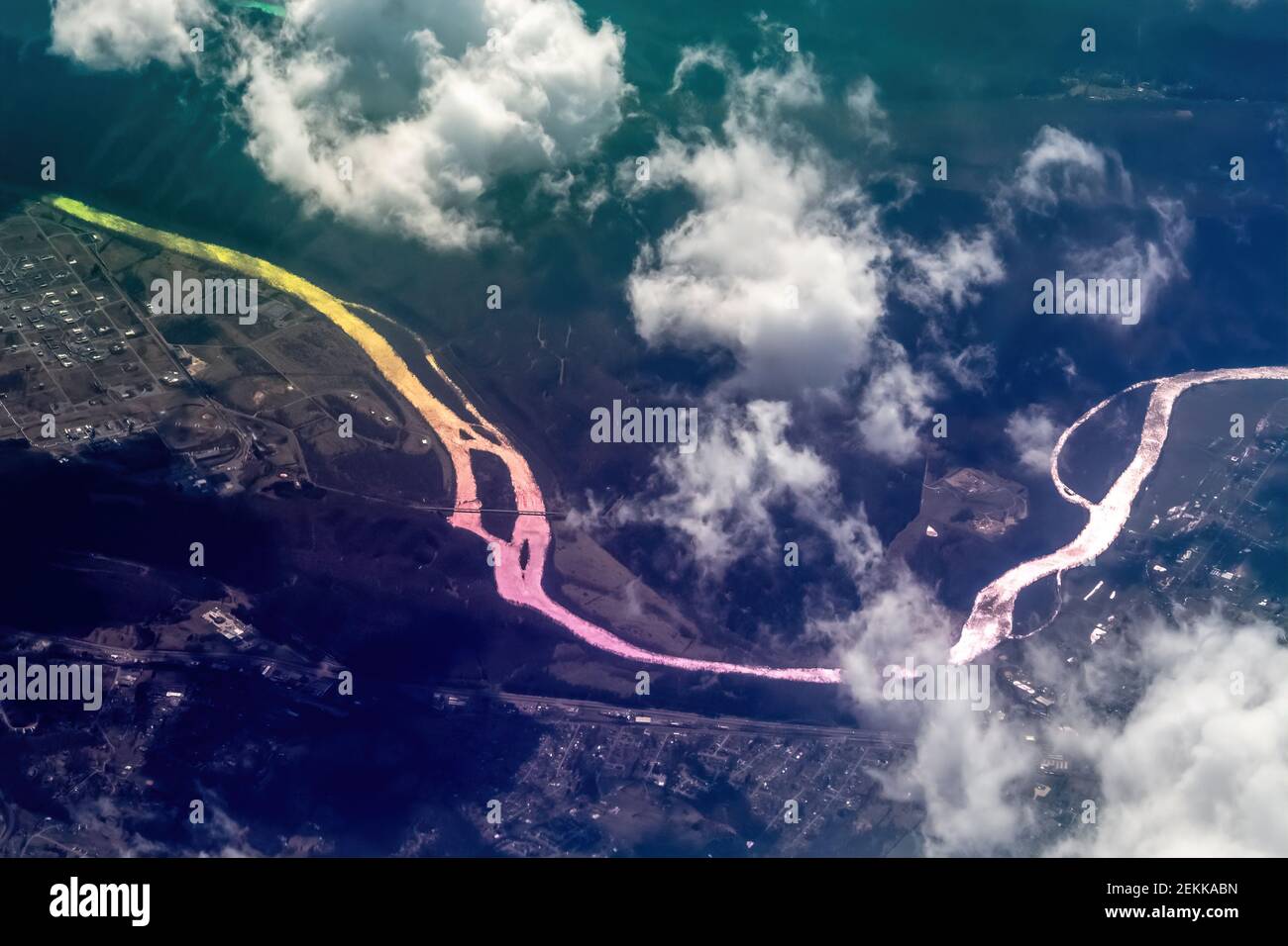 Aerial view of river through light refractions in a plane's window, Toronto, Canada Stock Photo