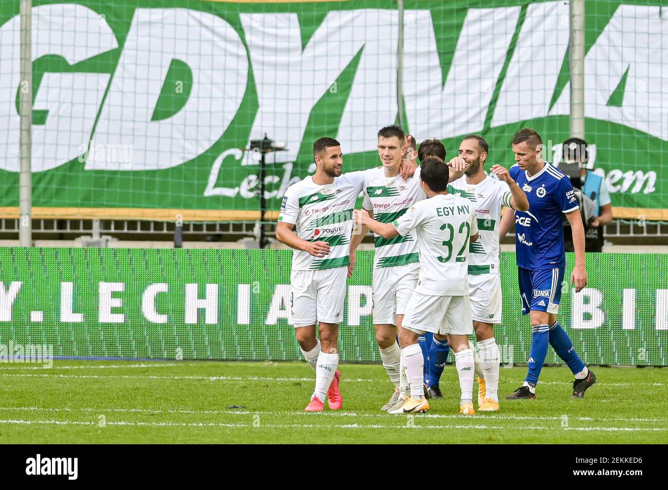 Michal Nalepa of Lechia seen celebrating a goal with his teammates