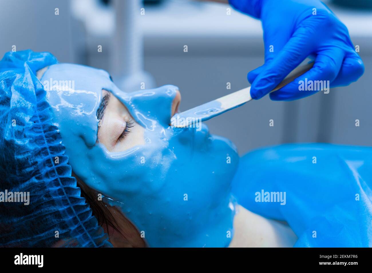 Alginate moisturizing mask for face and skin of young girl. Spa