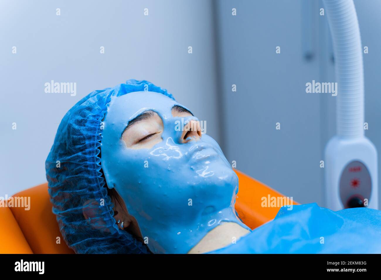 Alginate moisturizing mask for face and skin of young girl. Spa procedure for rejuvenation