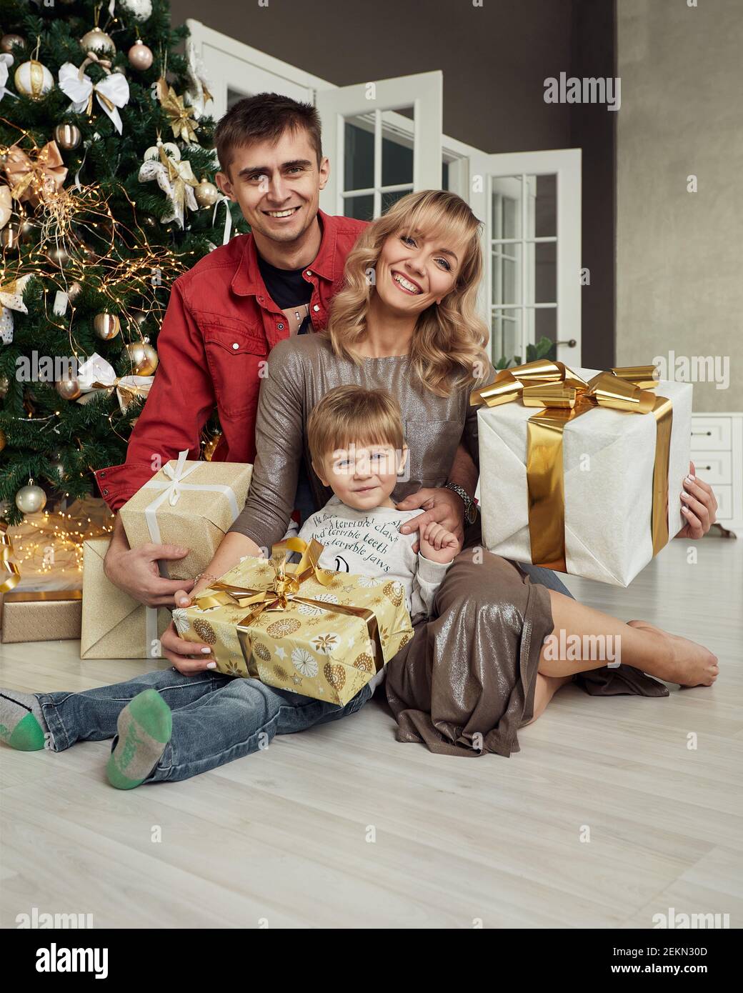Christmas Family Portrait In Home Holiday Living Room, Kids and Baby