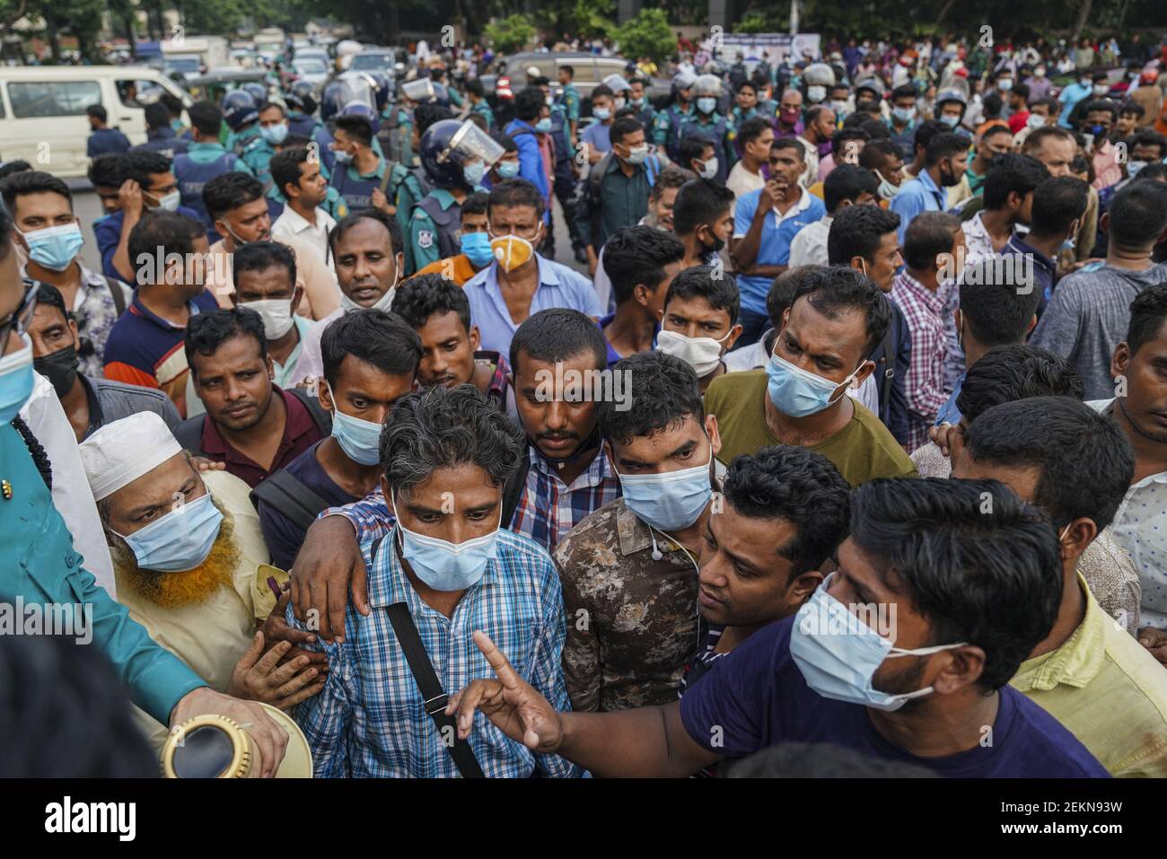 Several Bangladesh, migrant workers block a road in protest of their ...