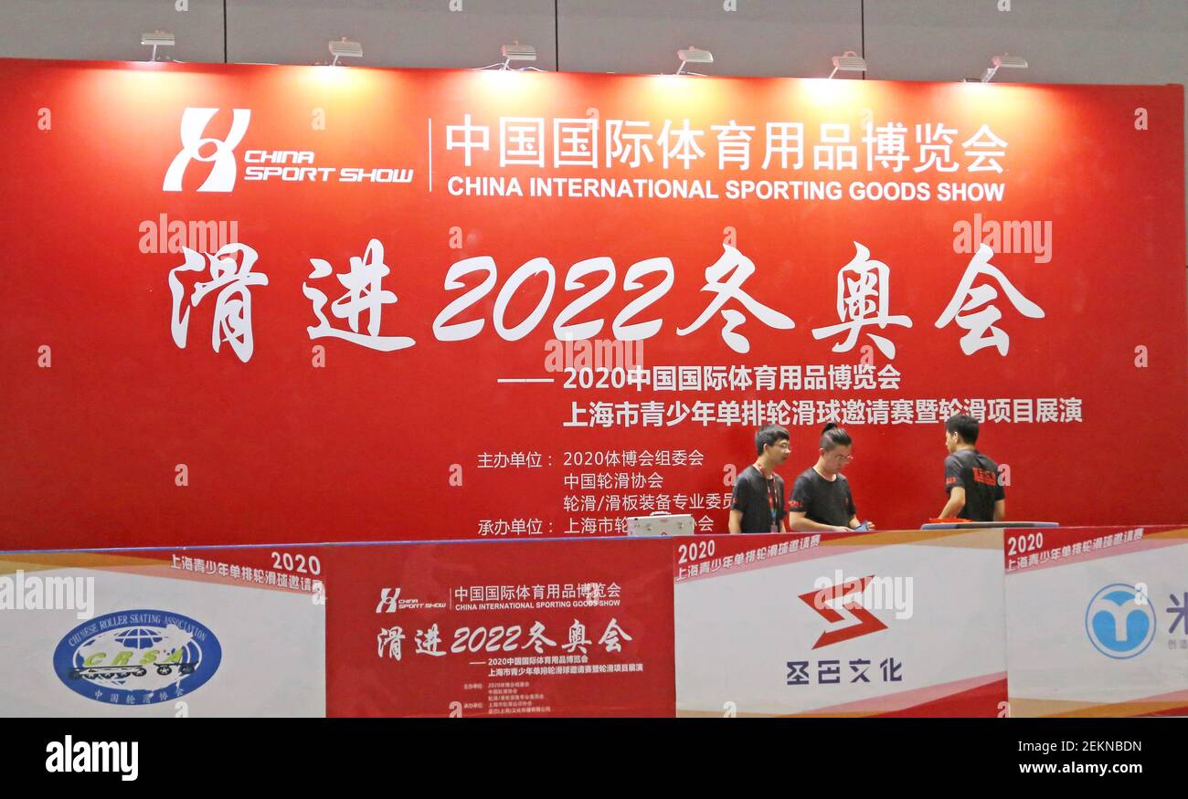 Shanghai China September 28 2020 The Staff Work At The Exhibition Stand Of Sliding Into 2022 Winter Olympics Shanghai China On September 28 2020 China International Sporting Goods Expo 2020