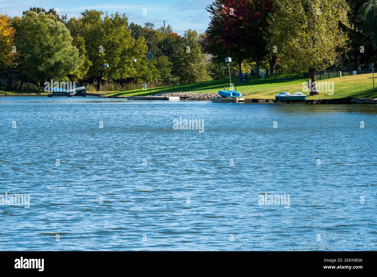 Private access lake off the back yards of homes. Docks, boats. Wichita, Kansas, USA Stock Photo