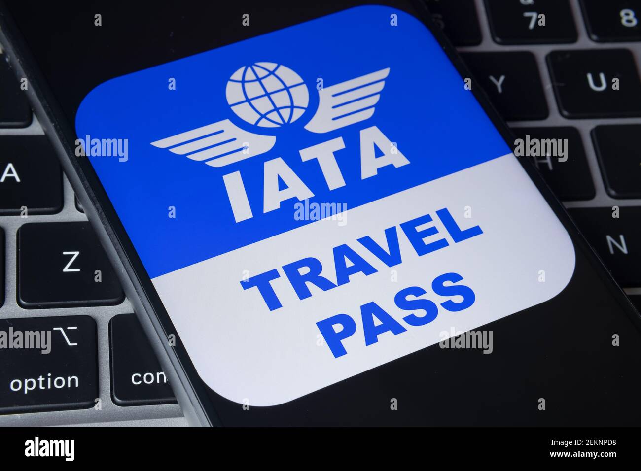 IATA logo with Travel Pass letters next to it seen on the screen of the smartphone. Stafford, United Kingdom, February 23, 2021. Stock Photo