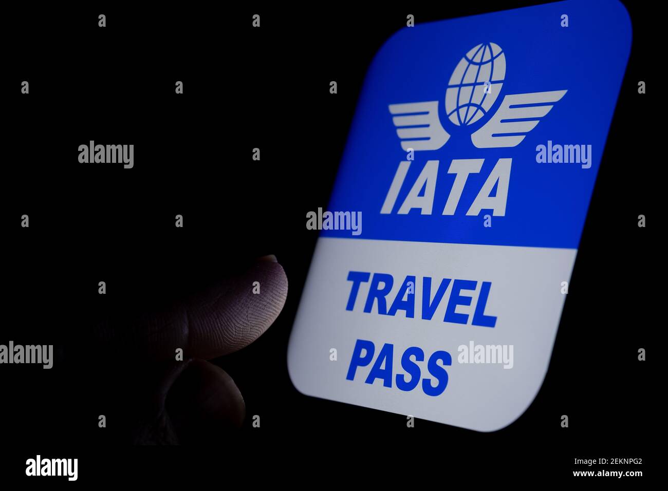 IATA logo with Travel Pass letters next to it seen on the screen of the smartphone. Stafford, United Kingdom, February 23, 2021. Stock Photo