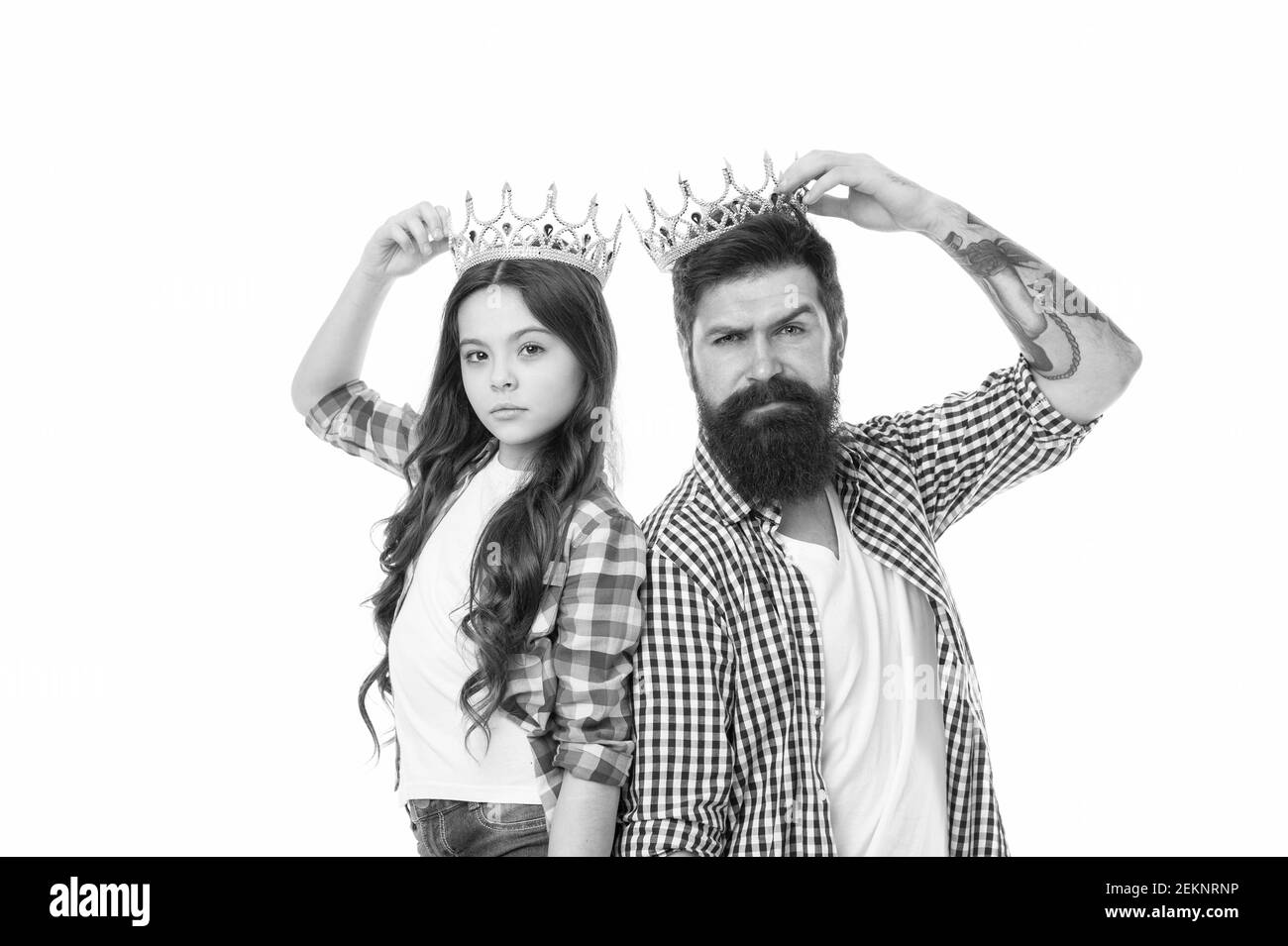 Are you going to prom. Prom king and young queen. Small child and bearded man hold prom crowns. Coronation party. Holiday celebration. Pride and glory. Prestige and fame. Ready for prom night. Stock Photo