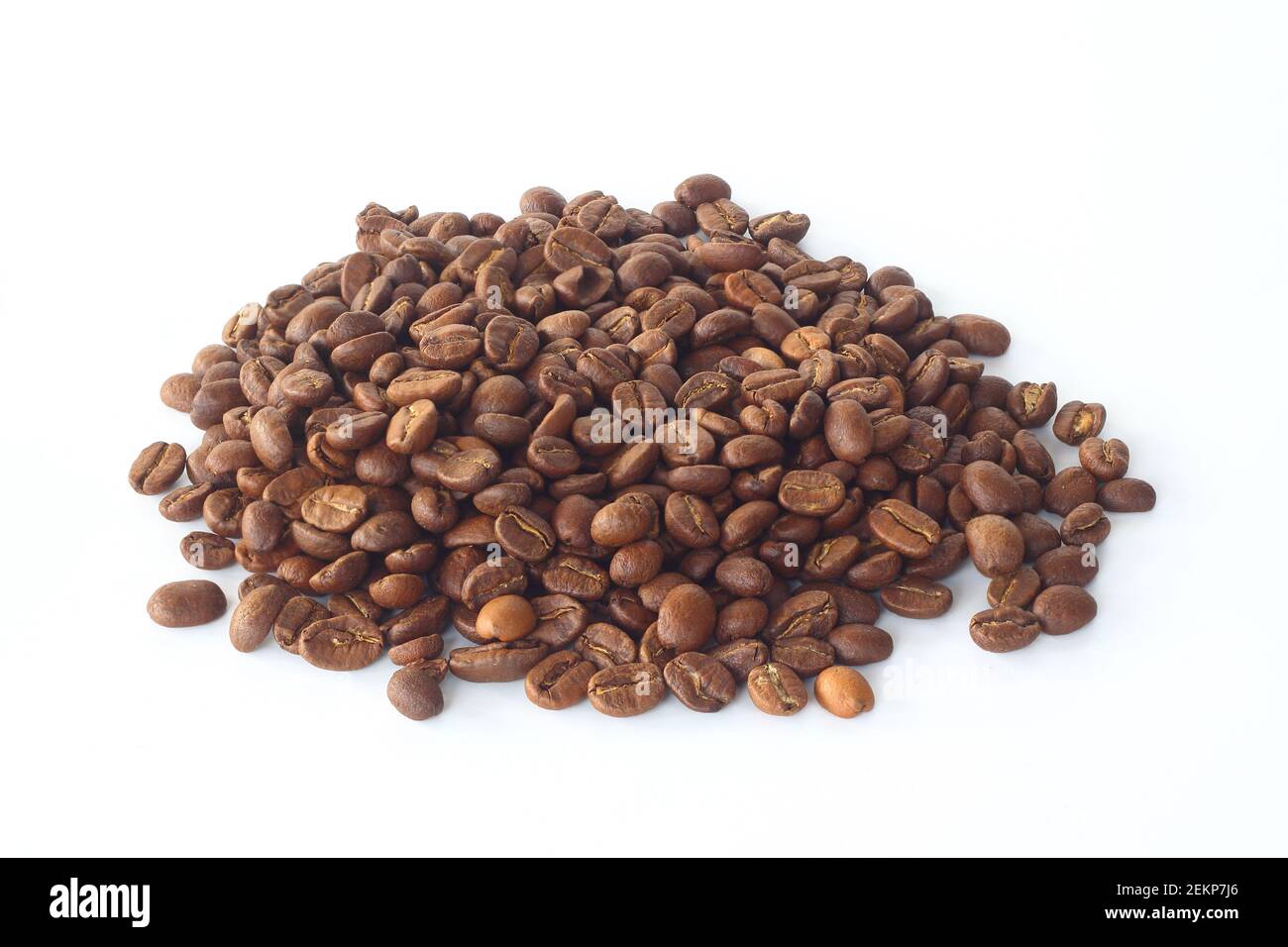 A pile of coffee beans isolated on white background. Roasted arabica ...