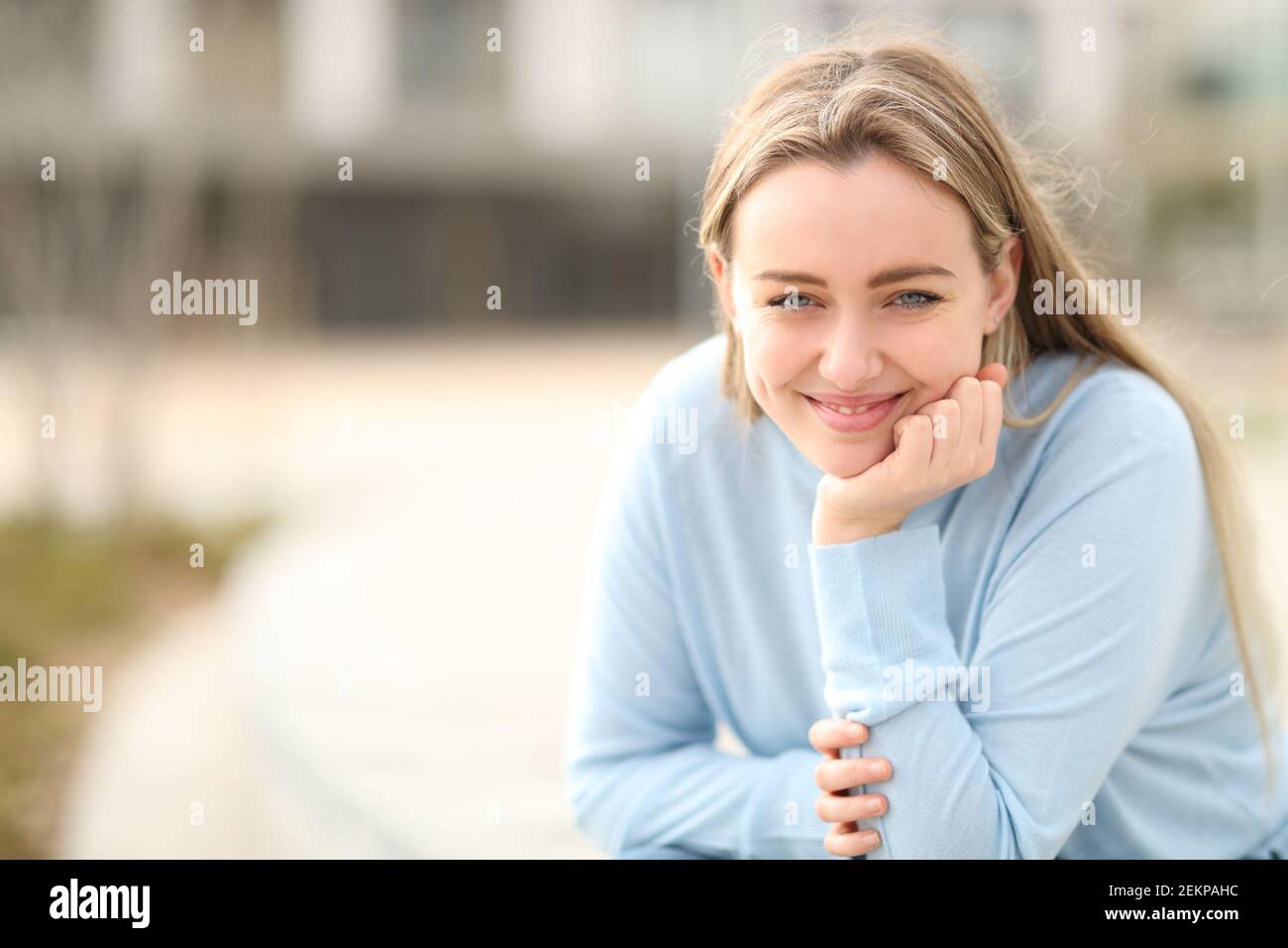 Front view portrait of a happy teen looking at camera in the street Stock Photo