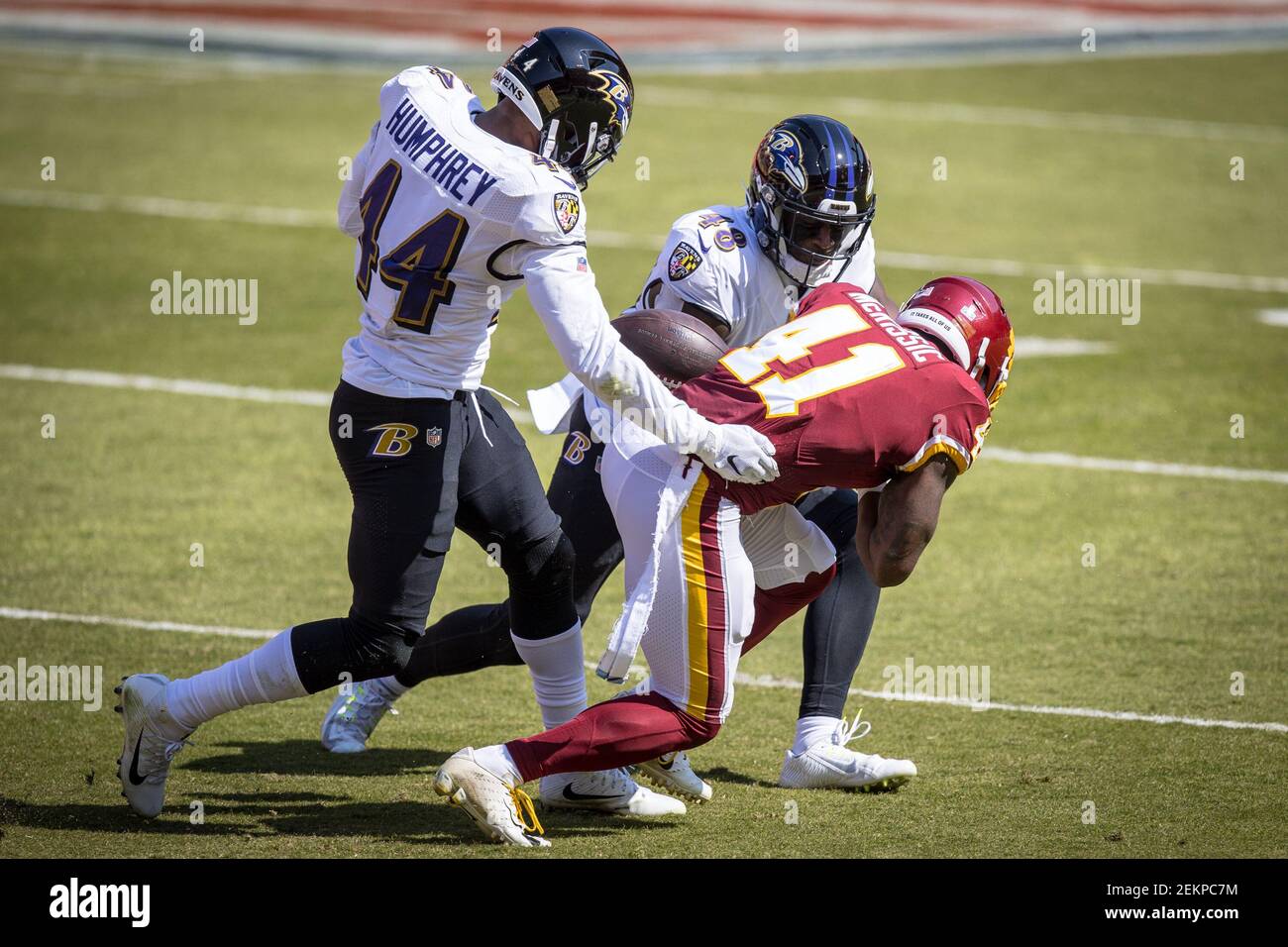 Baltimore Ravens cornerback Marlon Humphrey (44) warms up before