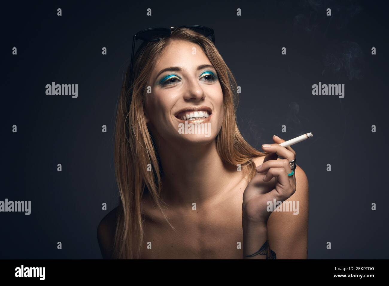 Smoking blonde woman hi-res stock photography and images - Alamy