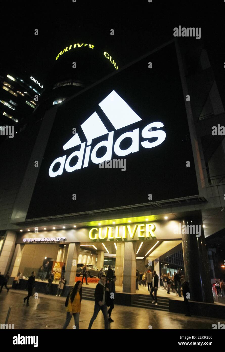 A huge screen shows the logo Adidas on a shopping mall building in downtown  Kiev Stock Photo - Alamy