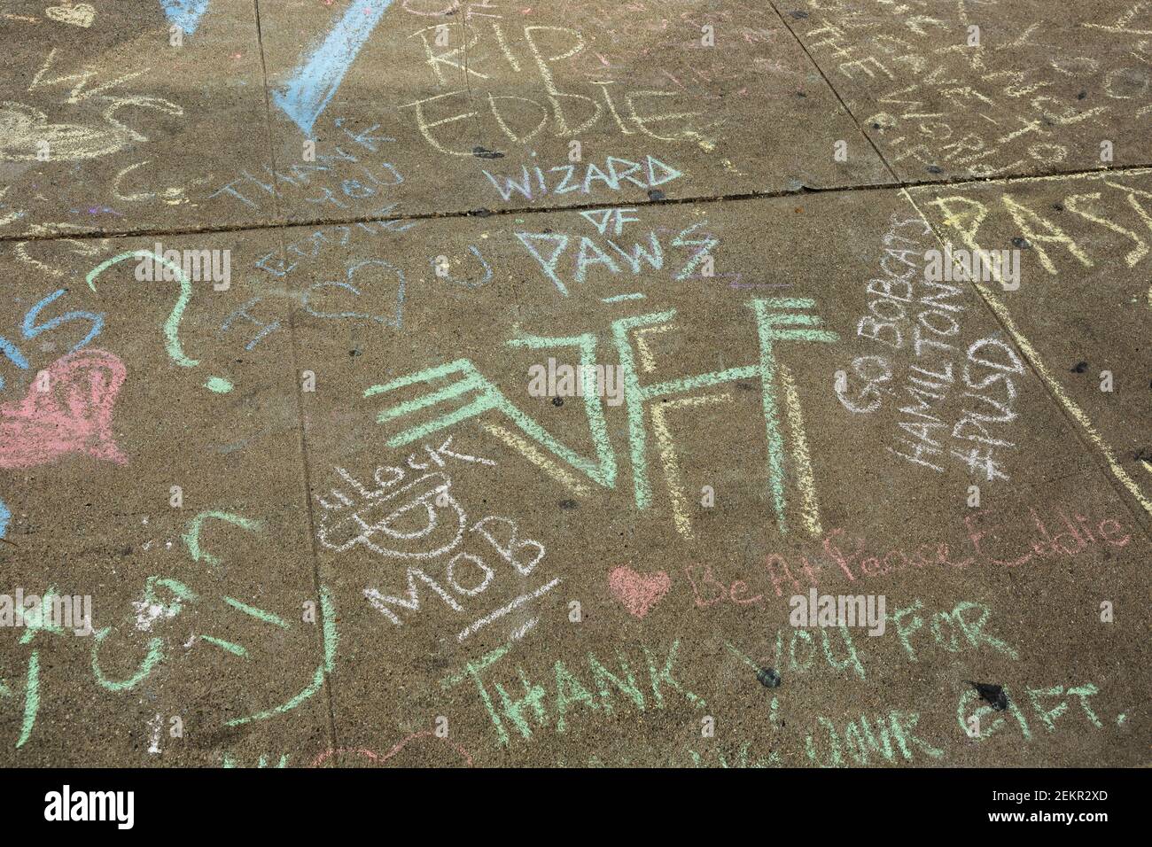 Sidewalk memorial for Eddie Van Halen who died earlier this week from complications of cancer. Eddie Van Halen was the founding member of the rock group Van Halen. He scrawled ÒVan HalenÓ on a sidewalk near his Pasadena childhood home when he was a teenager. 10/9/2020 Pasadena, CA USA (Photo by Ted Soqui/SIPA USA)  Stock Photo