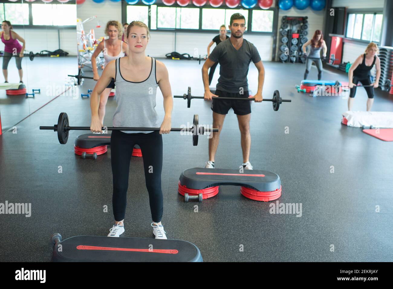 a group of people training in the gym Stock Photo - Alamy