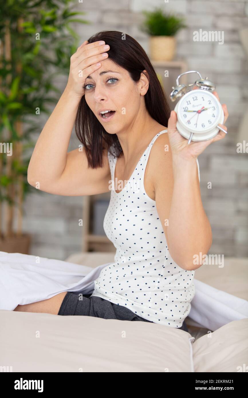 looking alarm clock terrorized by being late for work Stock Photo Alamy