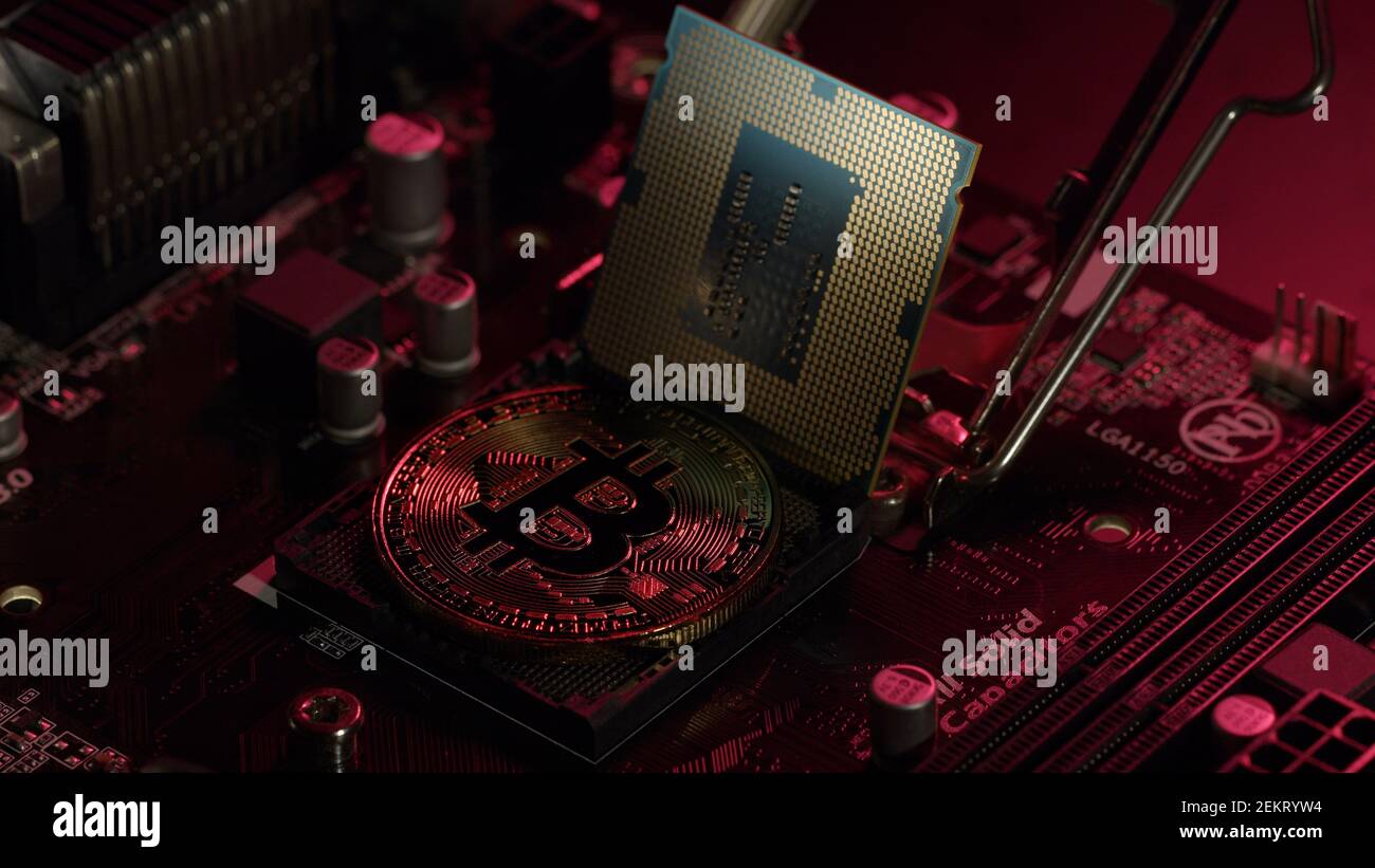 Crypto currency mining. Bitcoin BTC and CPU central processor on digital  technology computer motherboard. Concept of finance trading, economics,  cashless future, blockchain technology, virtual money Stock Photo - Alamy