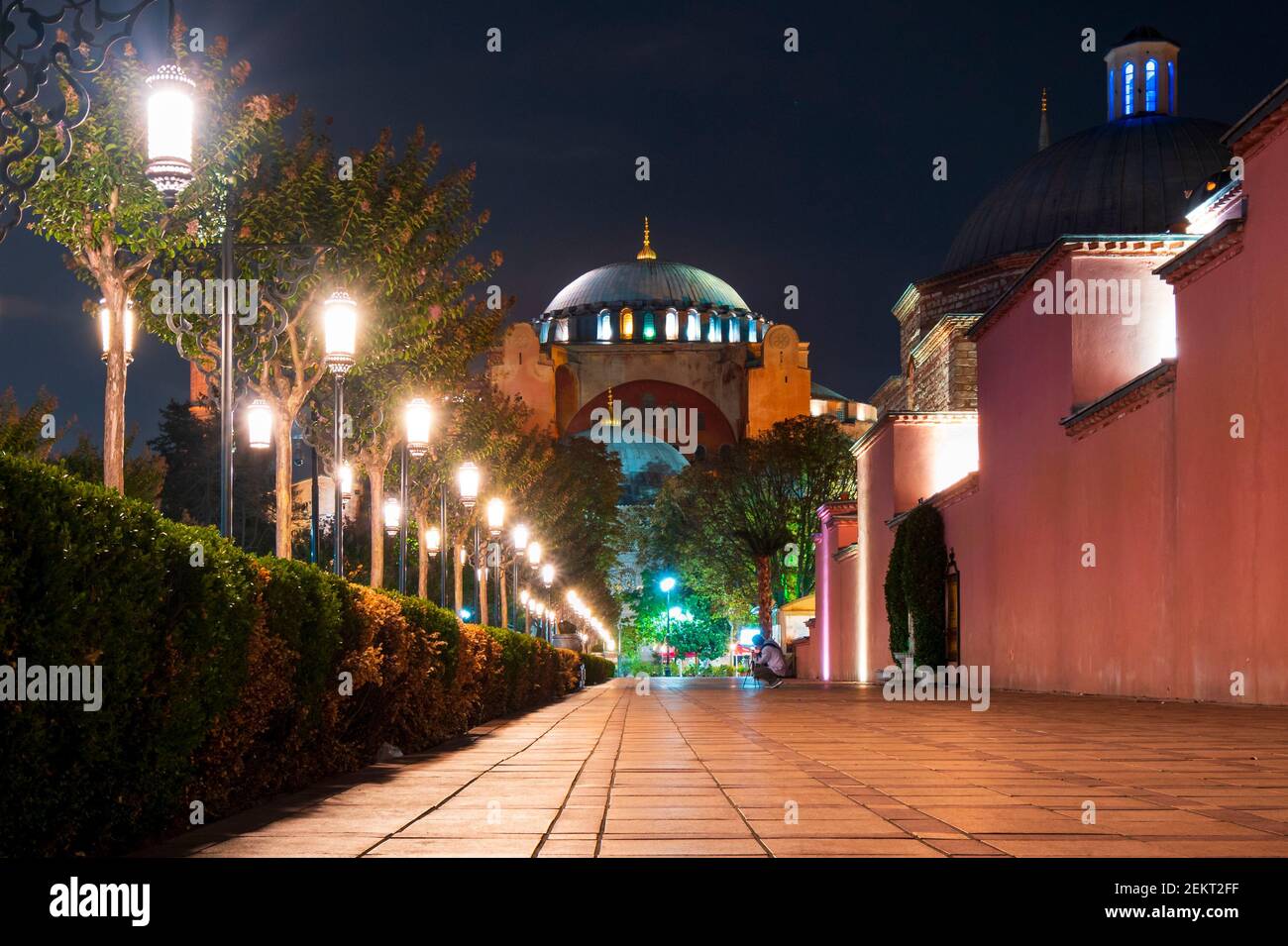 The ancient Hagia Sophia, once a cathedral and an Ottoman mosque and now a museum, illuminated at night in Sultanahmet Square in Istanbul Turkey. Stock Photo