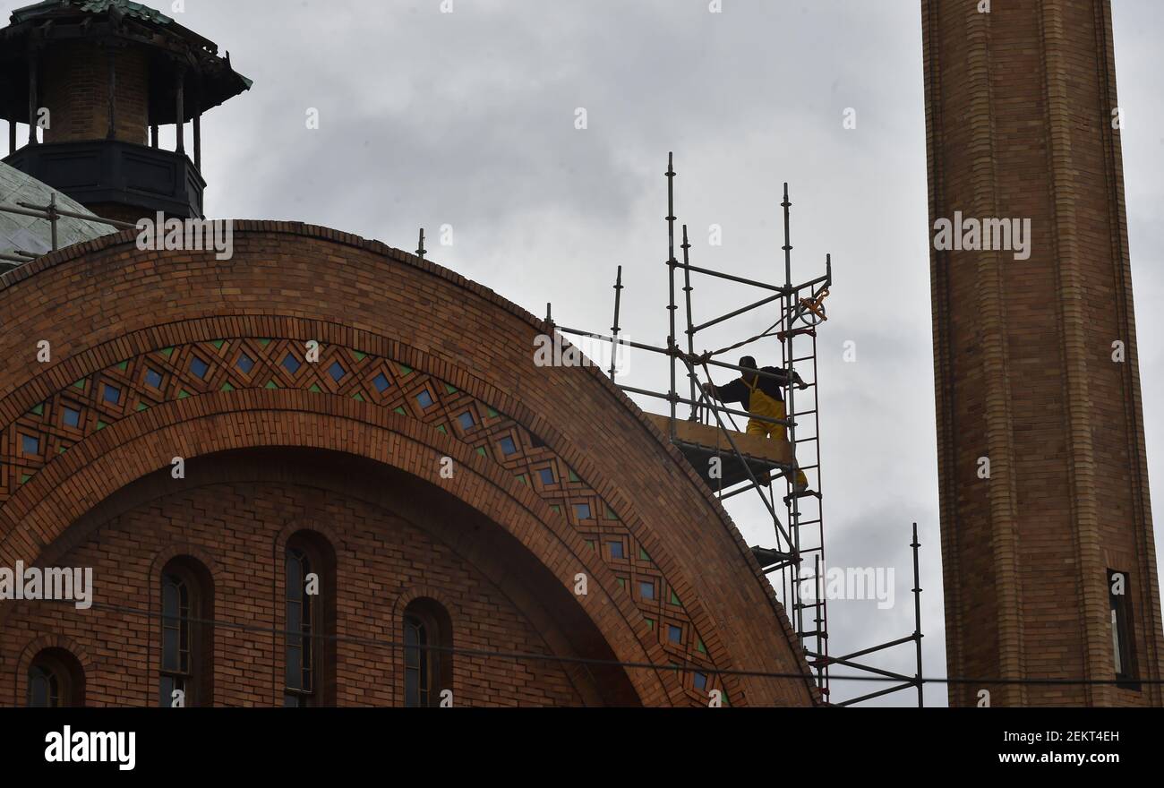 An employee from Dunmore roofing on the Irem Temple dome in WilkesBarre. The Irem Temple has