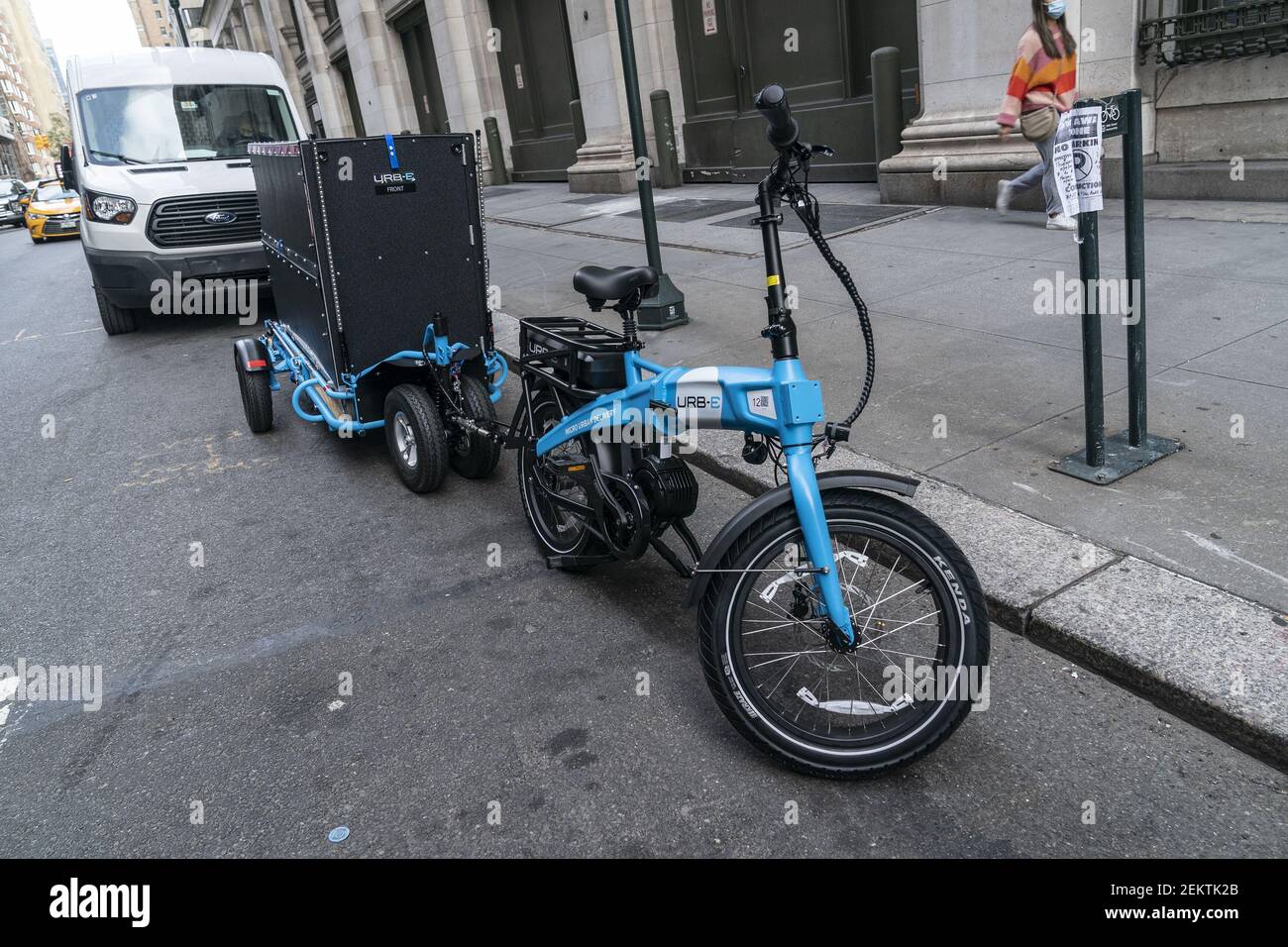 View of Urb-E bike and trailer to be used by Amazon employees for delivery  in New York. In order to make delivery more efficient and reduce greenhouse  gas emissions by cars Amazon