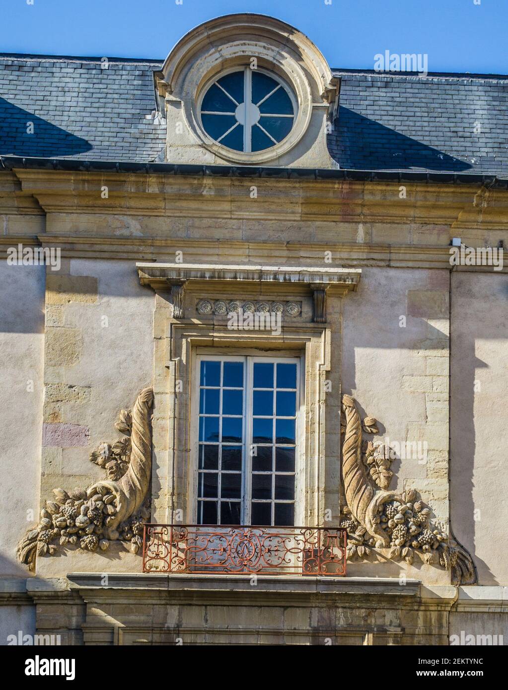 cornucopia adorned window at the east facade of the Palace of the Dukes in Dijon, Côte-d'Or department, Bourgogne-France-Comté region, France Stock Photo