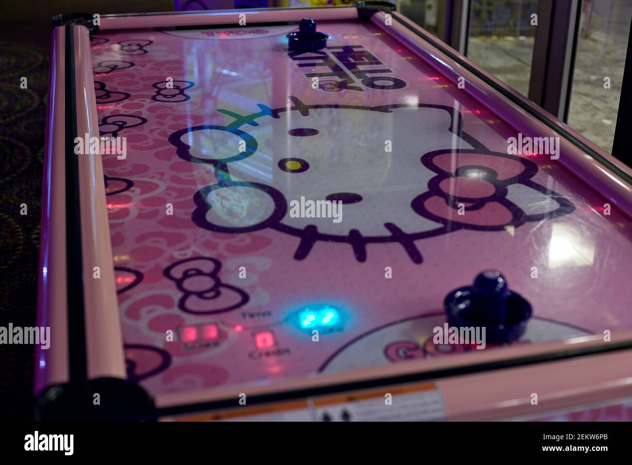 Hello Kitty, air hockey, high tops, puck, games, kid size, amusements, arcades, pink, Sanrio Stock Photo