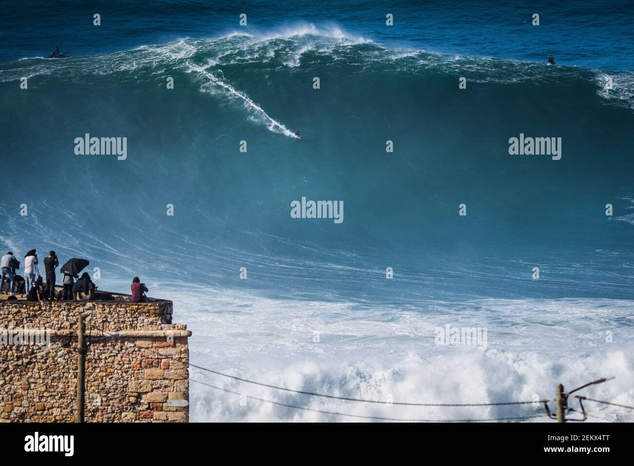 Big wave surfer Sebastian Steudtner from Germany rides a wave during a tow  surfing session at Praia do Norte on the first big swell of winter season.  (Photo by Henrique Casinhas /