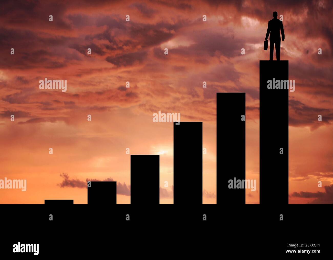 businessman on top of Column chart on the beach sunset. personal improvement and business success process. Growth and vision concept. Stock Photo