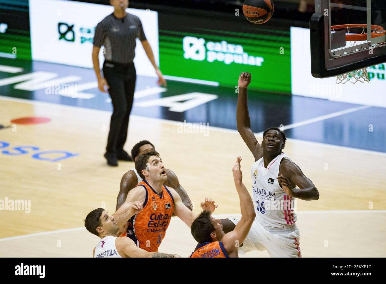 Usman Garuba of Real Madrid and Mike Tobey of Valencia in action during the  Spanish basketball league (Liga Endesa) match between Valencia Basket and  Real Madrid at the Fuente San Luis Pavilion