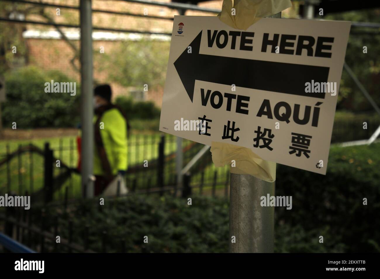 Vote Here signs are posted at a polling site in ChinaTown a section of