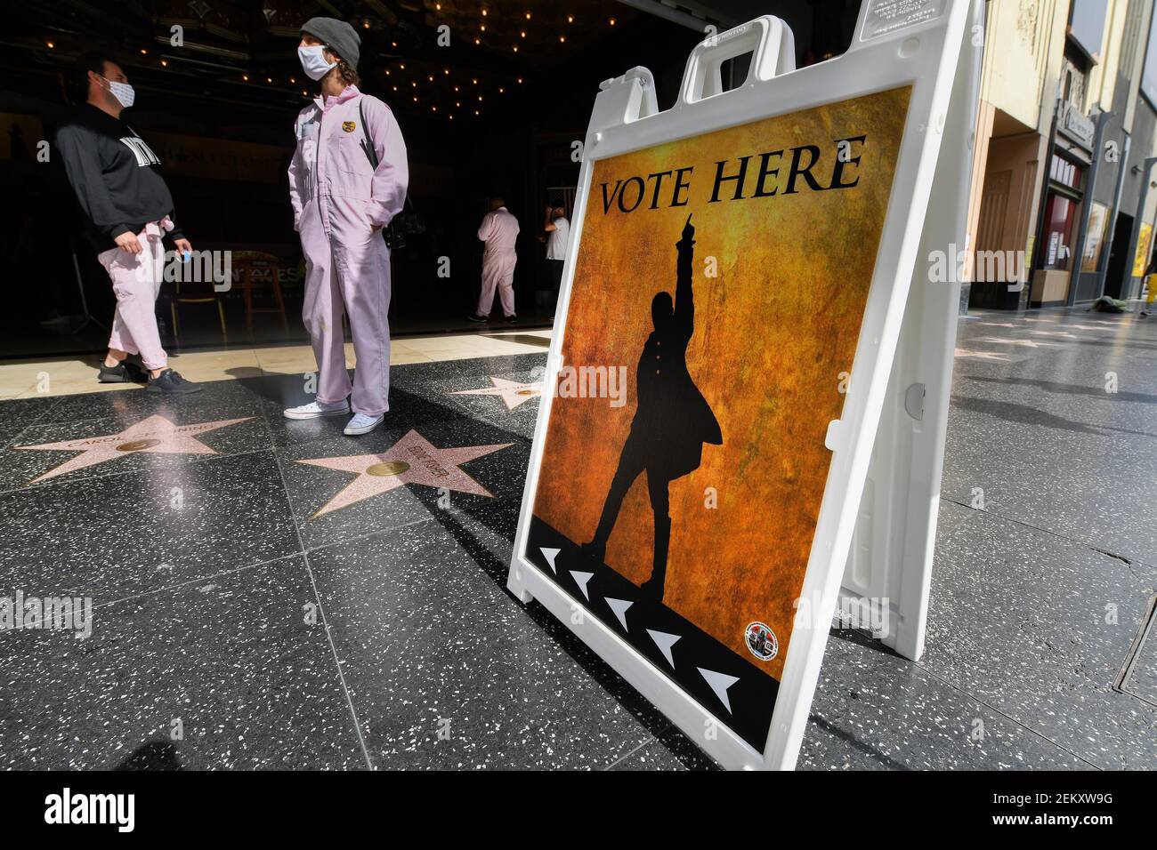 Nov 3, 2020; Los Angeles, California, USA; Drive through workers wait on the Hollywood Walk Of Fame in front of the Pantages Theater during election day for the 2020 Presidential election between Democratic candidate, former Vice President Joe Biden and Republican candidate President Donald Trump. Mandatory Credit: Robert Hanashiro-USA TODAY/Sipa USA Stock Photo