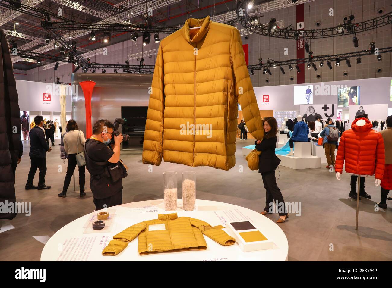 Japanese clothing brand Uniqlo sets up a 1,500-square-meter exhibition area  named "Museum of Tomorrow" at the China International Import Expo, 3 giant  down jackets suspended in the air attract lots of attention