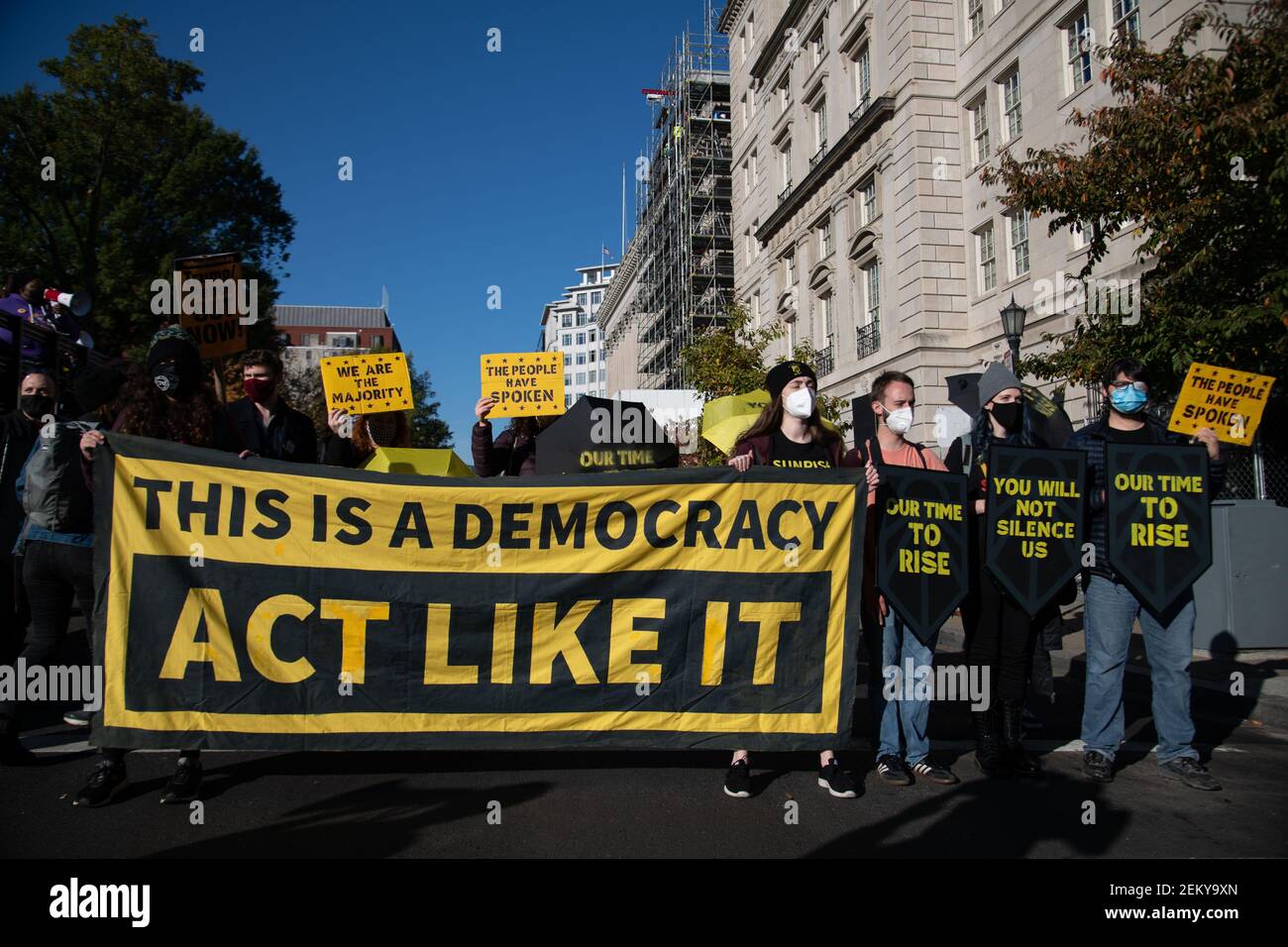 Protesters from the activist group Sunrise Movement march down H Street outside Lafayette Square in Washington, D.C. to express their objection to President Trump's response to the election results on November 5, 2020. (Photo by Matthew Rodier/Sipa USA) Stock Photo
