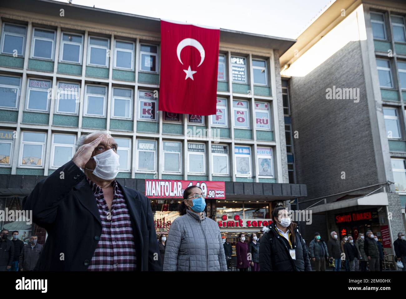 A Elderly Soldier Wearing A Facemask Salutes In Front Of The Turkish ...