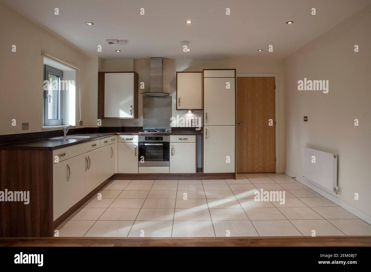 View of a kitchen area in a modern open plan apartment living area Stock Photo
