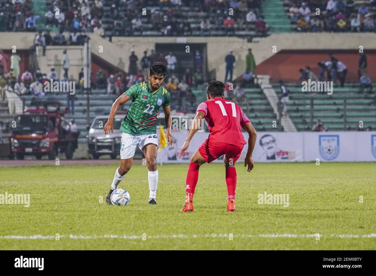Bangladeshi Saad Uddin (R) seen action during the First FIFA friendly match between Bangladesh and Nepal at Bangabandhu National Stadium in Dhaka
