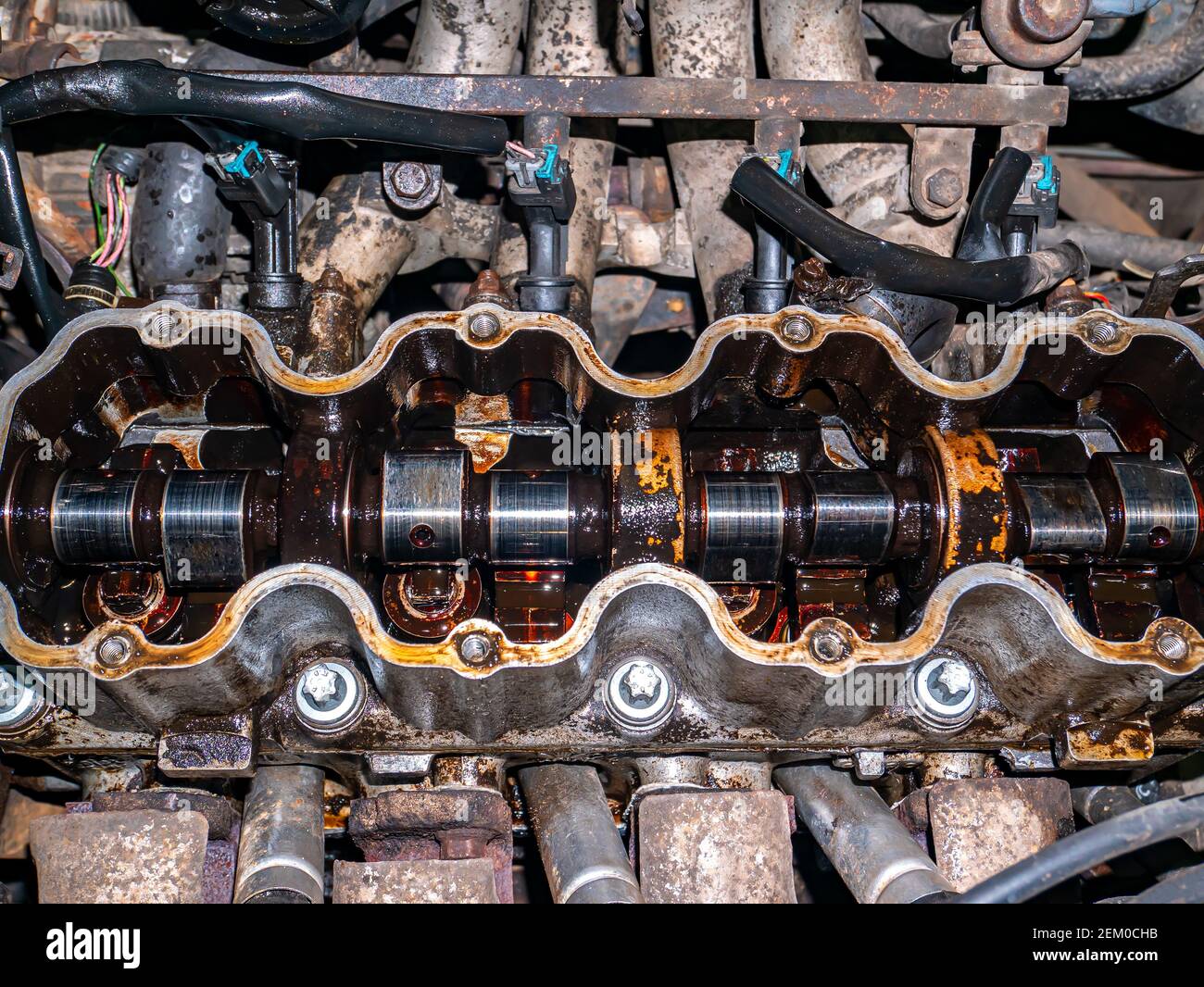 Repair of the cylinder head of a passenger car engine Stock Photo Alamy