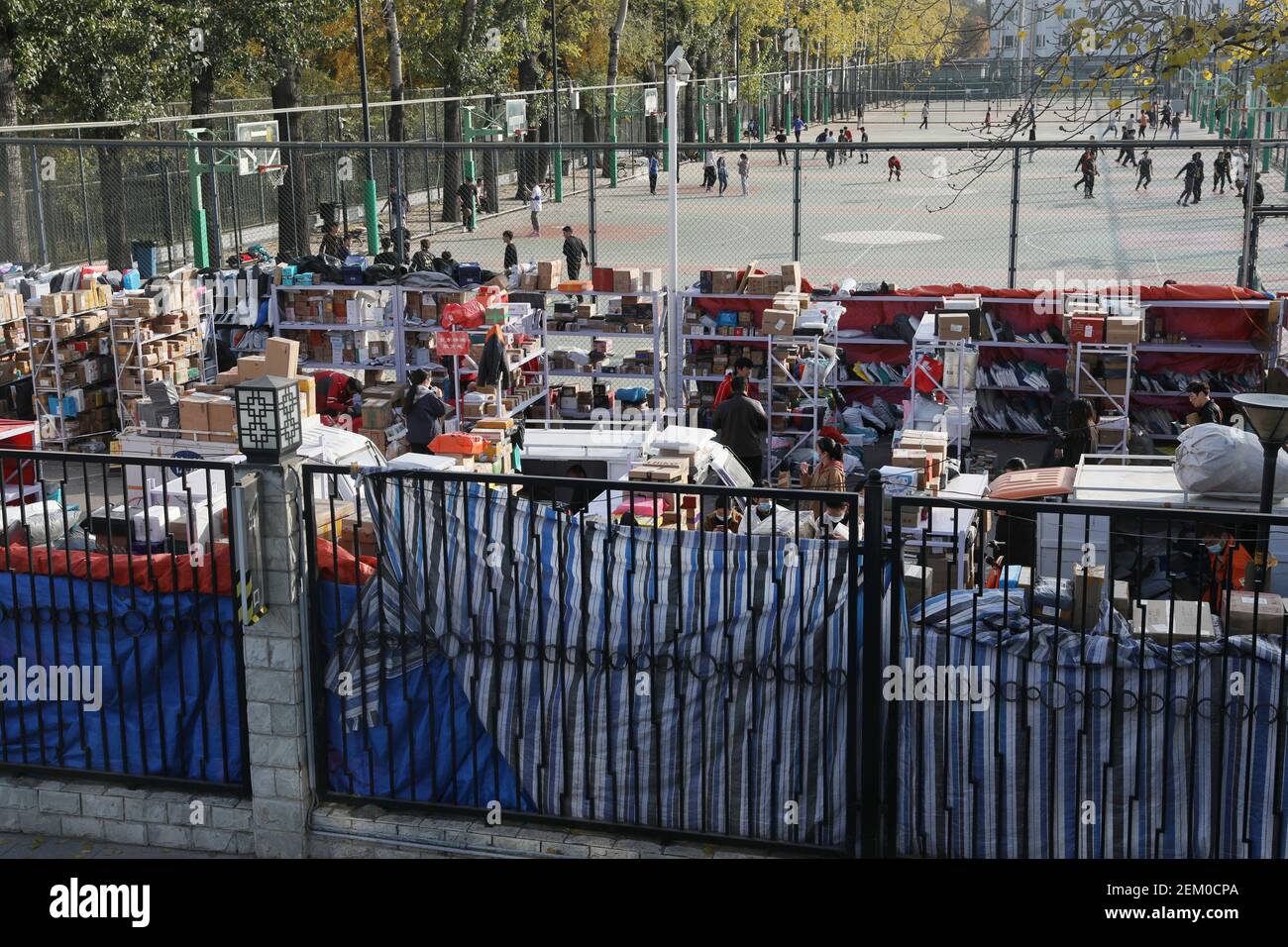 School staff sort and arrange deliveries at a university campus in Beijing,  China, 13 November 2020. (Photo by Xin Jingbao/ChinaImages/Sipa USA Stock  Photo - Alamy