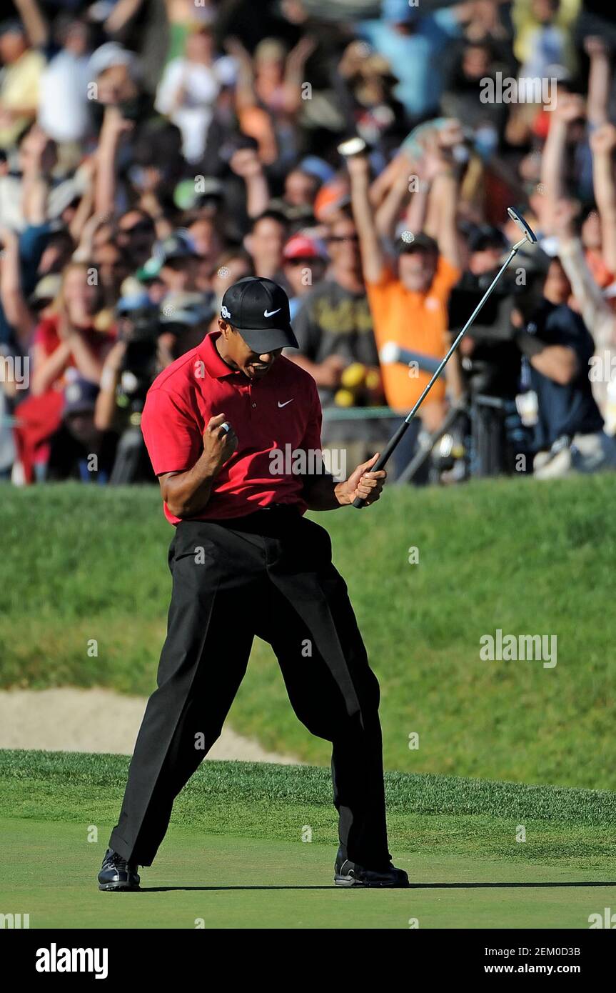 San Diego, CA. 15th June, 2008. Tiger Woods makes a birdie putt on the 18th hole Sunday to force a playoff with Rocco Mediate during the final round of the US Open at the Torrey Pines Golf Course in La Jolla California. Louis Lopez/Cal Sport Media. Credit: csm/Alamy Live News Stock Photo