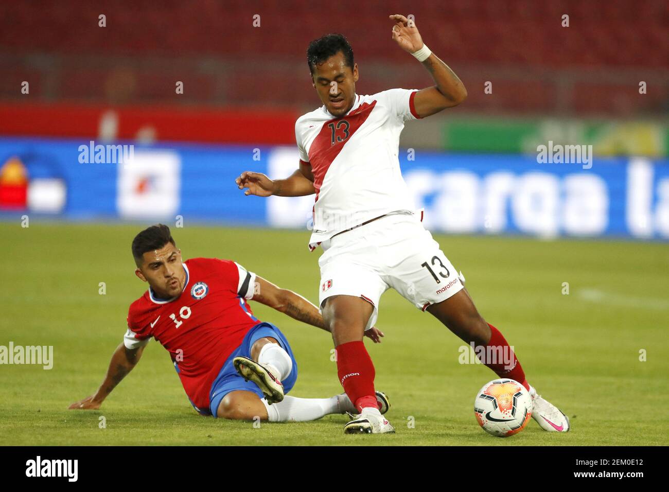 Cesar Pinares of Chile and Renato Tapia of Peru during the World Cup ...