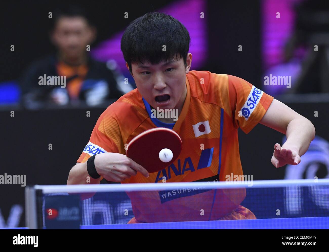 Japanese table tennis player Tomokazu Harimoto plays against South