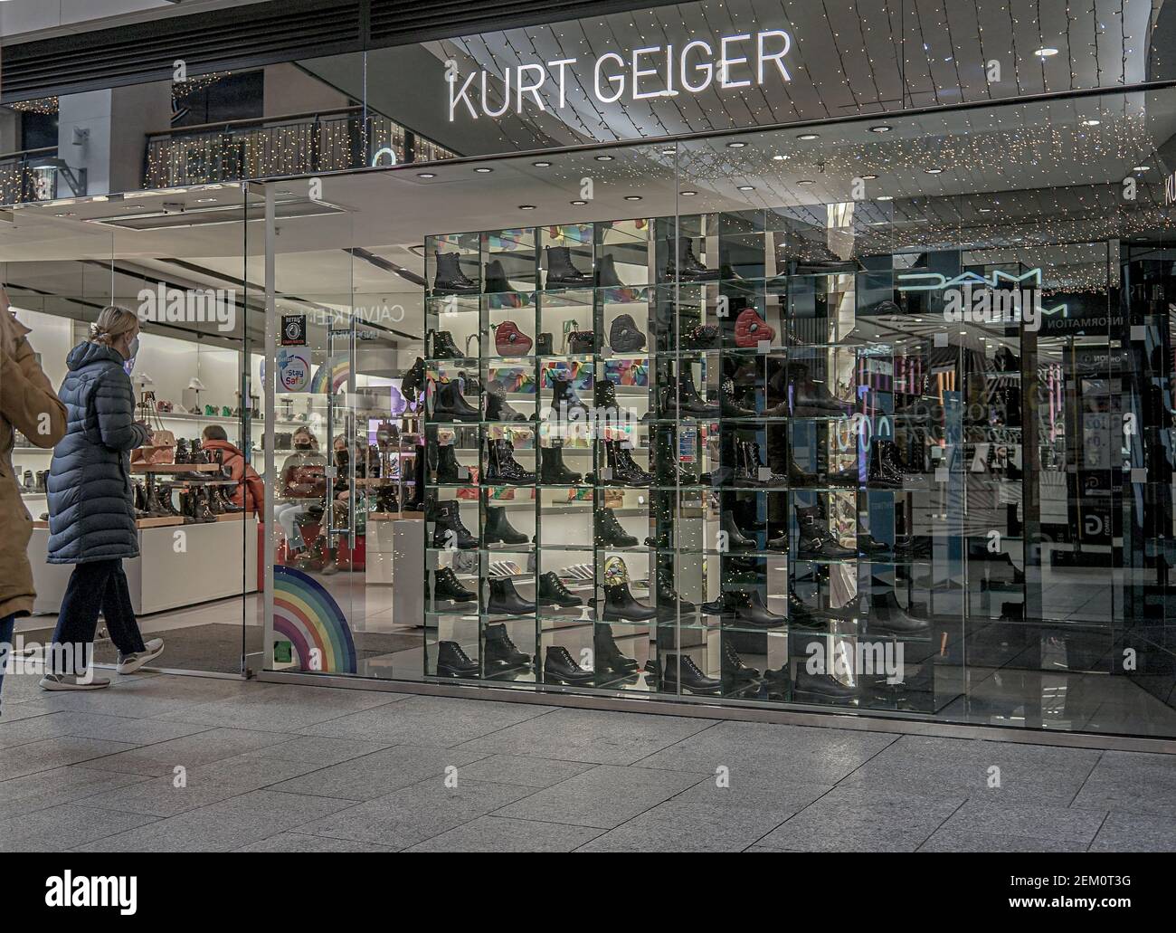 A customer wearing a face mask seen entering Kurt Geiger Store. (Photo by  Michael McNerney / SOPA Images/Sipa USA Stock Photo - Alamy