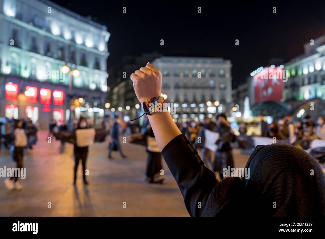Protester Inti A female protester raises her fist with a Wiphala flag bracelet during ...
