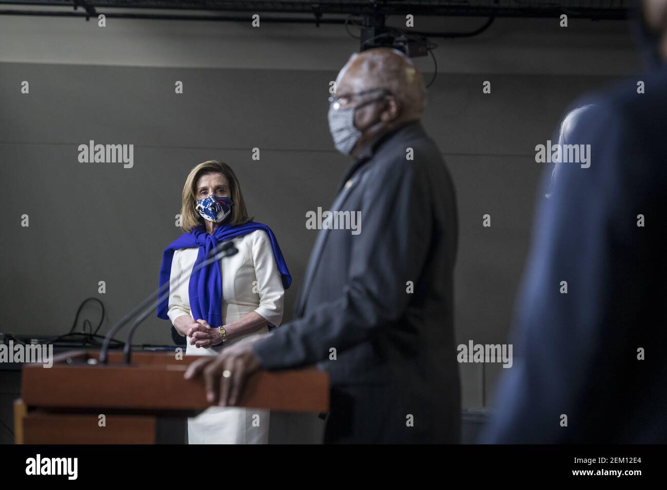 Speaker of the United States House of Representatives Nancy Pelosi (Democrat of California), left, listens as United States House Assistant Democratic Leader James Clyburn (Democrat of South Carolina) offers remarks as they are joined by other members of the House Democratic leadership, to offer remarks and field questions from reporters during a press conference at the US Capitol in Washington, DC, Wednesday, November 18, 2020. Credit: Rod Lamkey / CNP/Sipa USA Stock Photo
