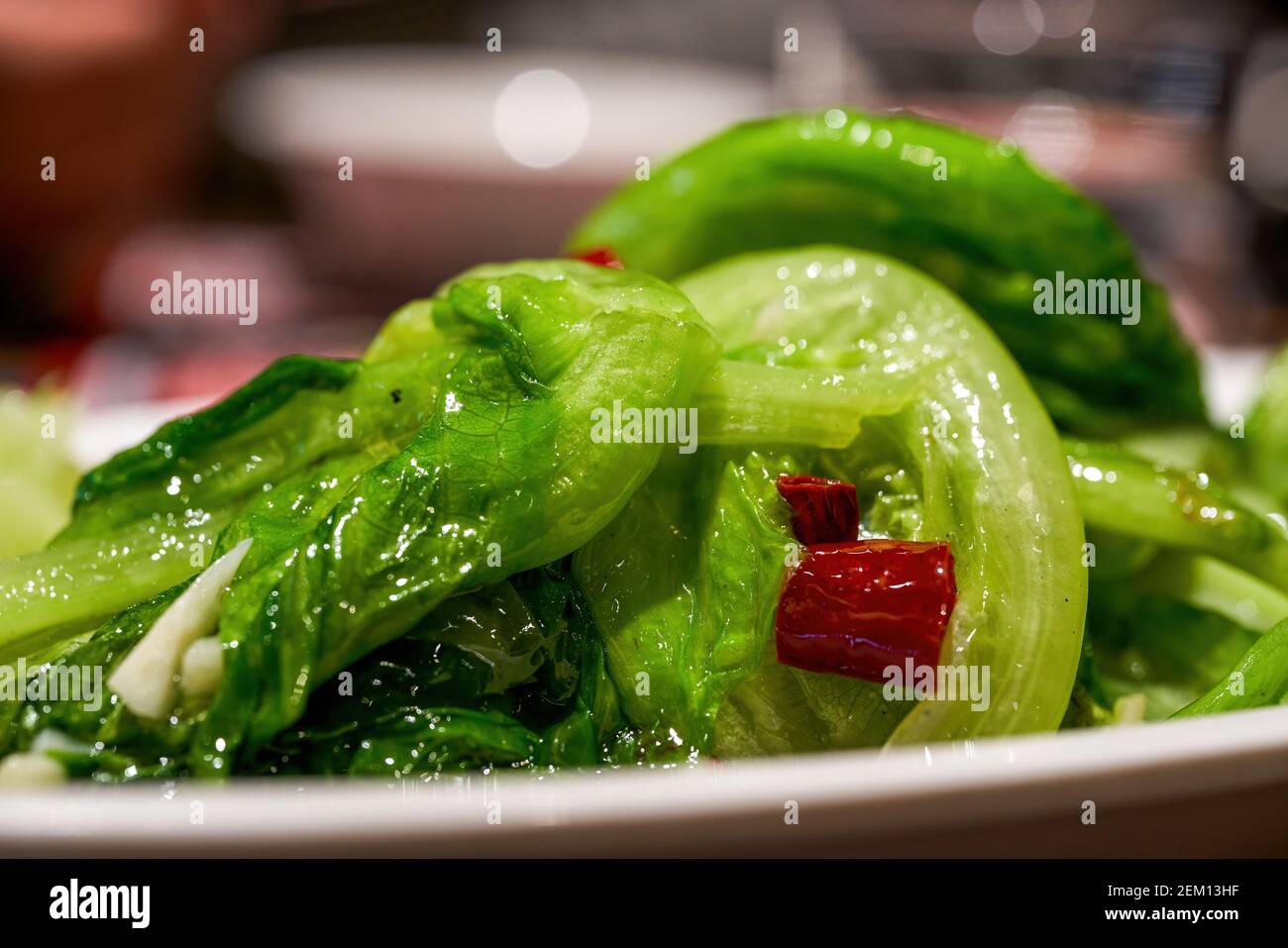 A dish of Chinese national dish, stirfried lettuce with garlic and chili Stock Photo Alamy