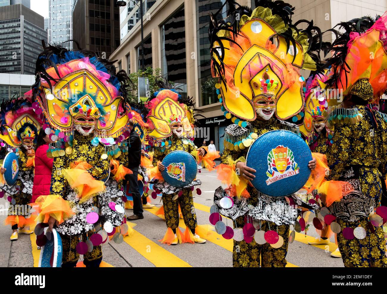 HONG KONG, CHINA - FEBRUARY, 26, 2017: Filipina domestic workers join a  parade through Central Hong Kong, celebrating the Masskara Festival.  Originati Stock Photo - Alamy, image size:1300x988