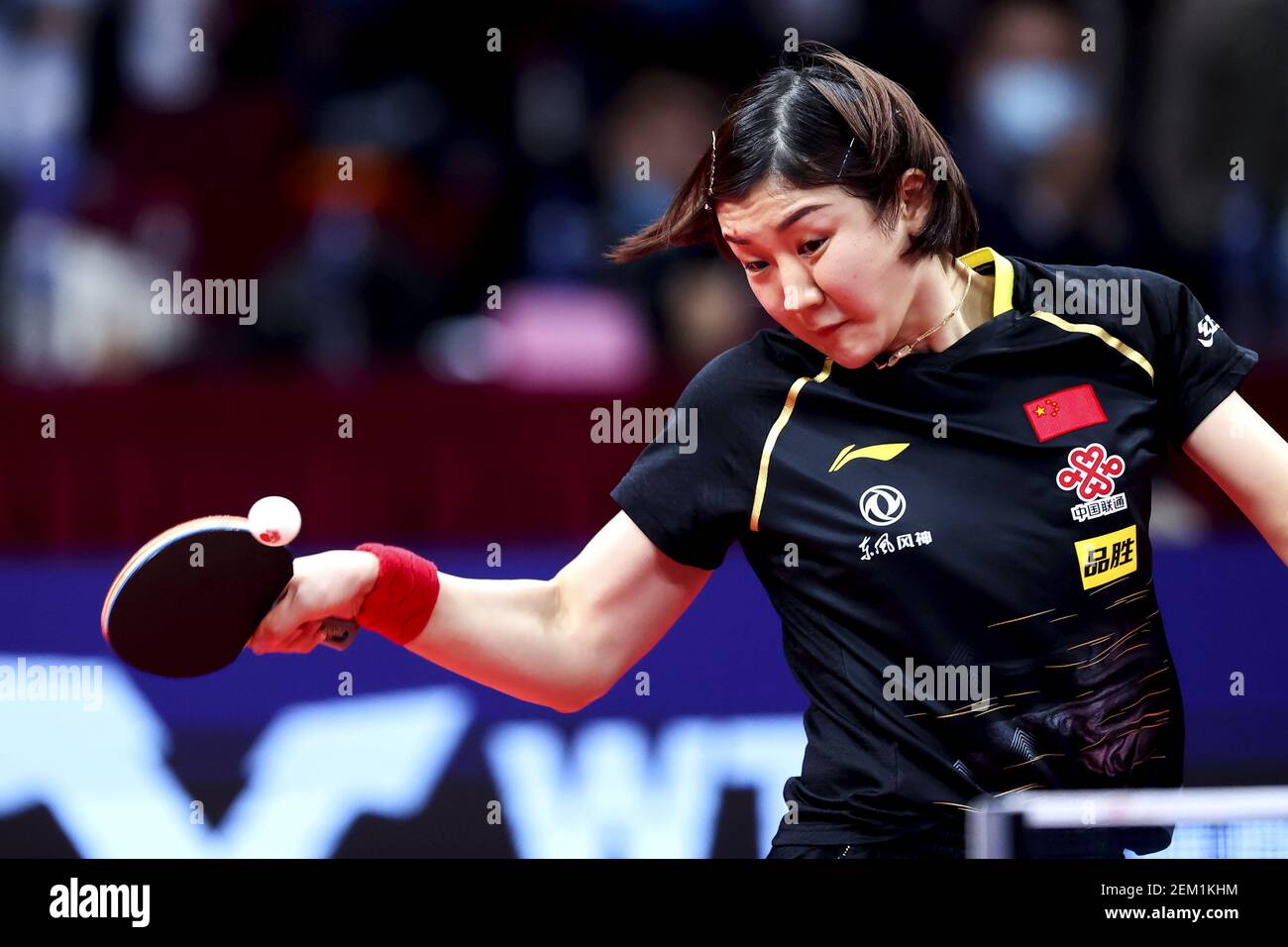Chinese table tennis player Chen Meng plays against Chinese table