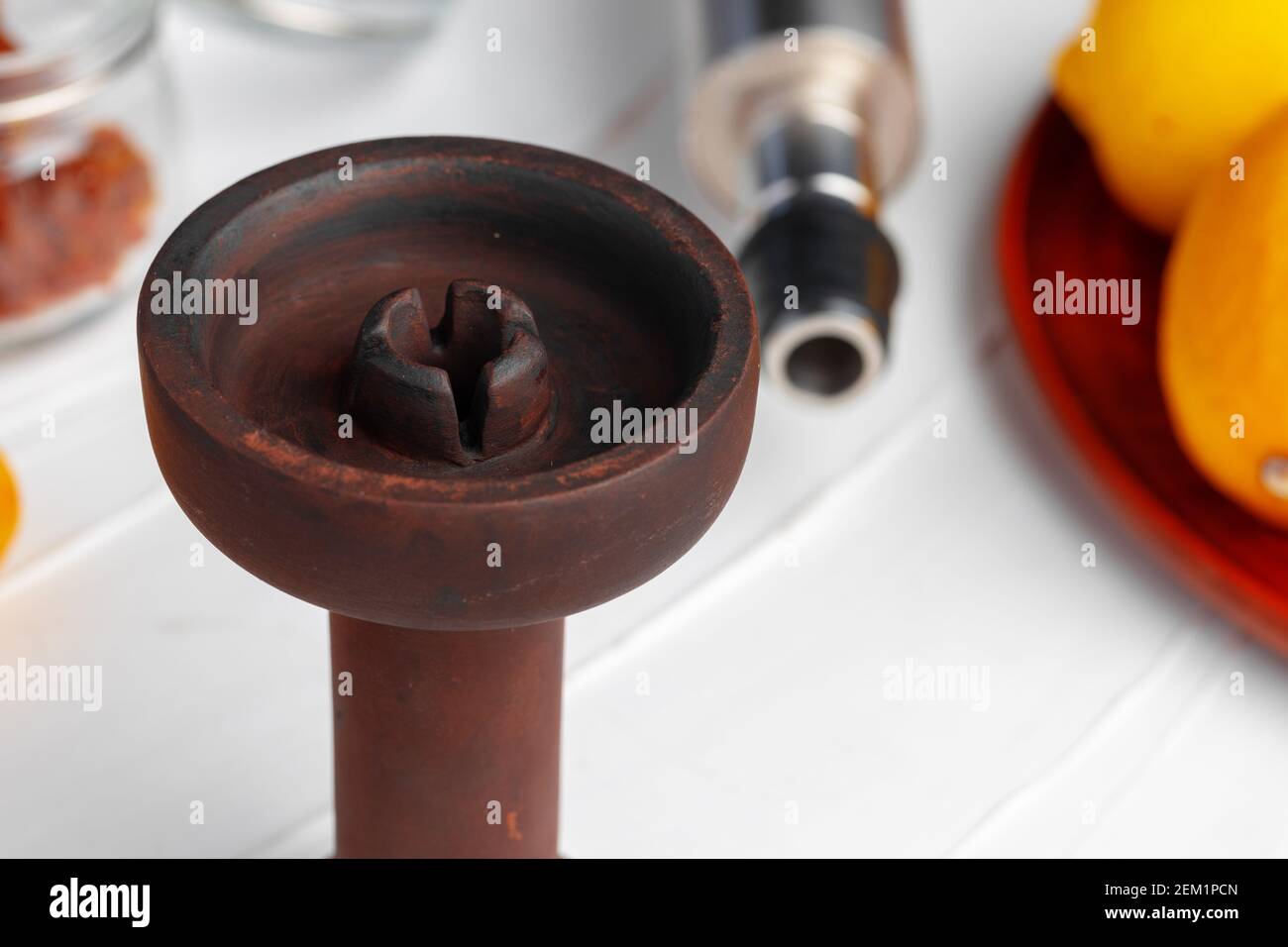 Empty hookah shaft close up on table with fresh fruit Stock Photo