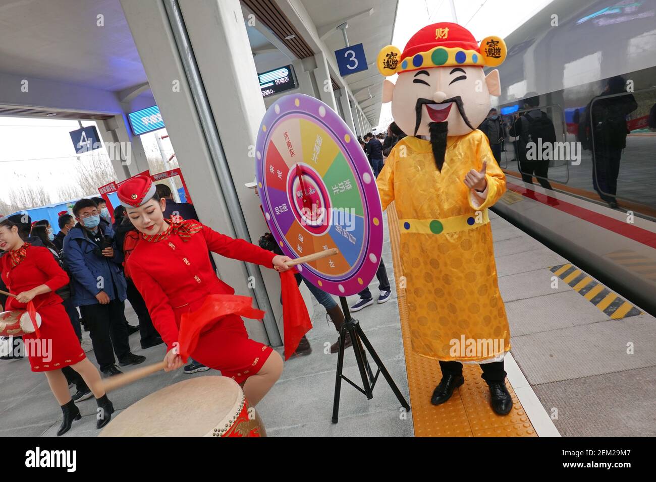 QINGDAO, CHINA NOVEMBER 26, 2020 Railway workers passengers