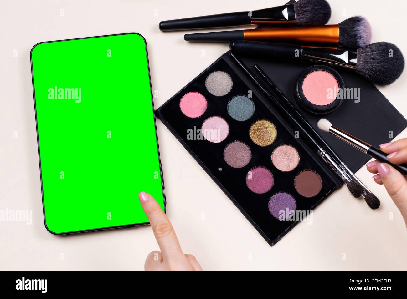 Makeup brushes, powder, eyeshadow palette, for the face beauty on 